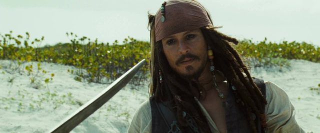 Pirates des Caraïbes : le secret du coffre maudit - Photos et affiches. 29 Johnny Depp Orlando Bloom et Keira Knightley dans Pirates des Caraïbes : le secret du coffre maudit 2006