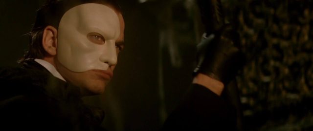 Le Fantôme de l’Opéra (2004) - Photos et affiches. 9 Gerard Butler Emmy Rossum et Patrick Wilson dans Le Fantôme de l'Opéra 2004