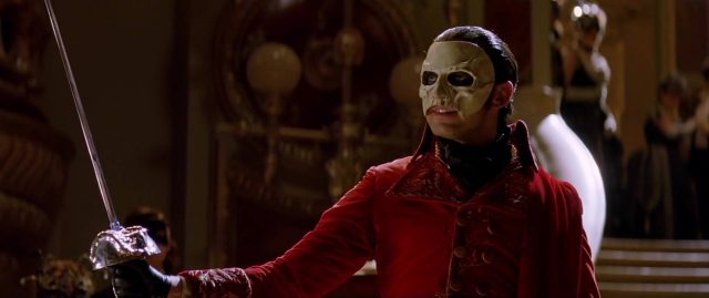 Le Fantôme de l’Opéra (2004) - Photos et affiches. 20 Gerard Butler Emmy Rossum et Patrick Wilson dans Le Fantôme de l'Opéra 2004