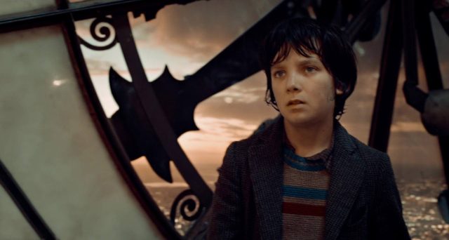 Hugo Cabret - Photos et affiches. 16 Asa Butterfield Ben Kingsley et Chloë Grace Moretz dans Hugo Cabret 2011