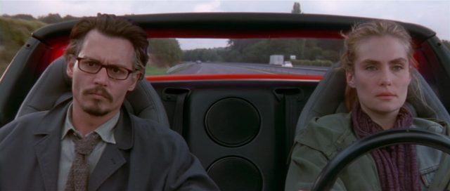 La neuvième porte - Photos et affiches. 8 Johnny Depp et Emmanuelle Seigner dans La neuvième porte The Ninth Gate 1999