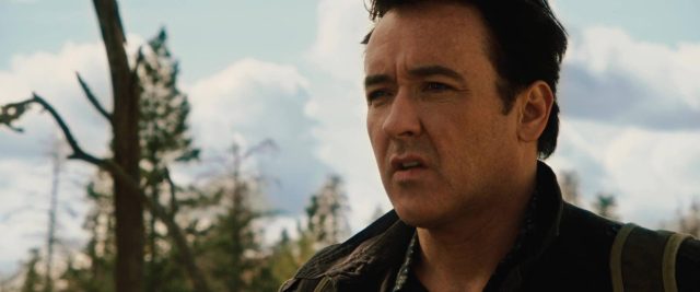2012. 4 John Cusack et Chiwetel Ejiofor dans 2012 2009